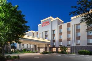 a rendering of the front of a hotel at Hampton Inn & Suites Fresno in Fresno
