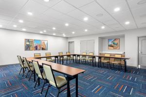 a conference room with a table and chairs at Hampton Inn & Suites Chicago Deer Park in Deer Park +99 photos