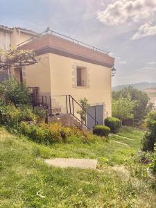 a house with a grassy yard in front of it at Villa Terrazos in Terrazos