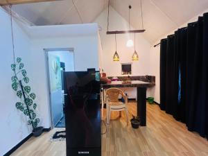 a room with a table and a dining room at Kekulama Eco Cabana Galle in Galle