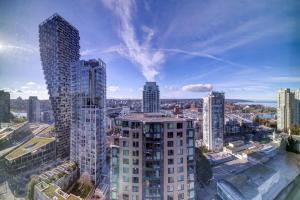an aerial view of a city with tall buildings at The Canadian in Vancouver