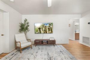 a living room with a chair and a table at Sedona 2BR Near Trails & Shops in Sedona