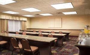 a conference room with a long table and chairs at Embassy Suites by Hilton Flagstaff in Flagstaff
