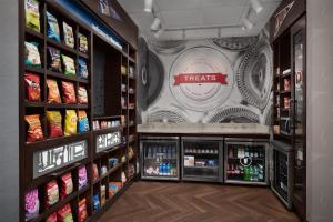 a grocery store aisle with drinks and food at Hampton Inn & Suites Baltimore North/Timonium, MD in Timonium