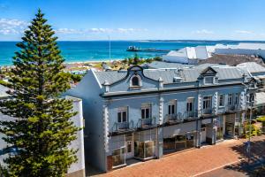 an aerial view of a building with a tree at Geraldton Shoreline Lodge in Geraldton