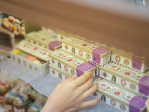a person is selecting food in a store at Takarazuka Washington Hotel in Takarazuka
