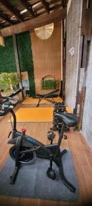 a row of exercise bikes in a gym at Matianellu SP in São Paulo