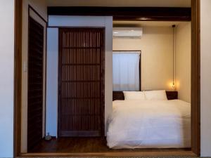 Llit o llits en una habitació de kitsuji