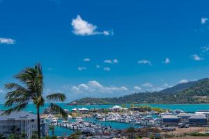 a view of a harbor with boats in the water at Spa Haven 17B Ocean View in Airlie Beach