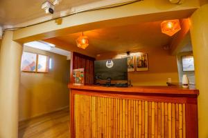 a lobby with a reception desk in a building at The Social Fortuna in Fortuna