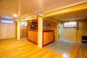 an empty room with a bar in a building at The Social Fortuna in Fortuna +31 photos