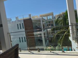 a view of a house from the beach at Scandi Villas Boracay by Simple Realty Management in Boracay