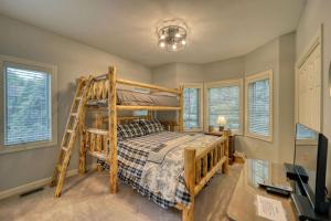 a bedroom with a bunk bed and a desk at Sugar Mountain Condo, Sleep 4, Deck Mountain Views in Sugar Mountain