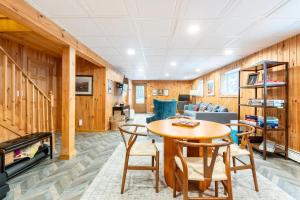a living room with a table and chairs at Mountain View Chalet Ski, Hot Tub, Firepit, Games in Lexington