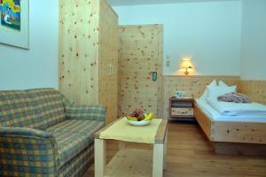 Postel nebo postele na pokoji v ubytování Hotel Rauscher - Das Naturteichparadies