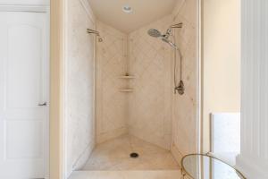 a bathroom with a shower with a walk in shower at Hampton Luxe House in Coquitlam +42 photos