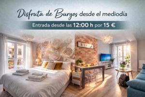 a bedroom with a large bed and a table at Edificio Aptos Turisticos - Burgos Centro HC7 in Burgos