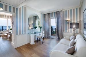 Гостиная зона в Cala del Porto Punta Ala - Preferred Hotels