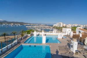 arial view of a swimming pool on a resort at Sunside Ibiza Studios - Only Adults in San Antonio