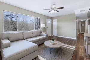 a living room with a couch and a table at Quiet Getaway, Travis' Place! Affordable Location in Rossville +27 photos