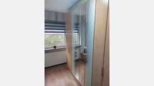 a room with a window and a mirror at Hebels Auszeit in Heimbach +31 photos