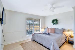 a bedroom with a bed and a window at Countryside Retreat with Views! Red Clay Farmhouse in Cleveland +56 photos