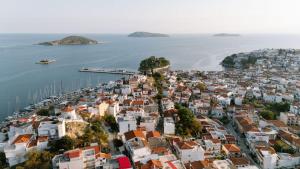 an aerial view of a city and the ocean at kallos of Skiathos in Skiathos