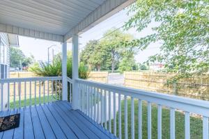 a screened porch with a view of the street at Crossroads Cottage l Grill & high speed internet in Chattanooga