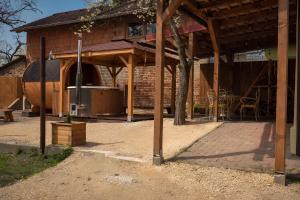 a house being constructed with a wooden roof at KLOBUCKÉ RETRO bydlení a wellness in Valašské Klobouky