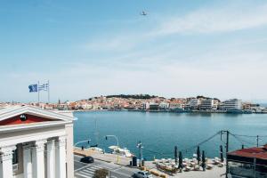 a view of a body of water with a city at Aether View Premium Views in Central Mytilene in Mytilene