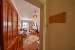 a room with a hallway with a living room at Aether View Premium Views in Central Mytilene in Mytilene