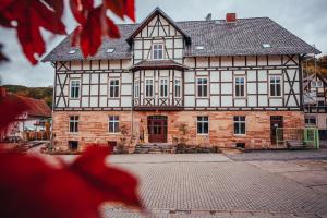 a large brick building with a large building at Gutshof Vogt in Geismar