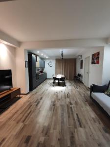 a living room with a couch and a table at CIVICO 1 in Valguarnera Caropepe