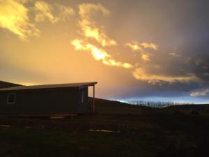 Sólarupprás eða sólsetur séð frá eða í nágrenni sumarhússins