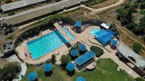 an overhead view of a swimming pool at a resort at Shifon Ein Zivan in Ein Zivan