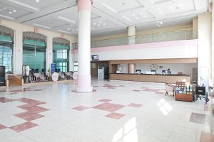 a large building with a lobby with a check in counter at Ilsung Resort Sulak in Goseong +26 photos