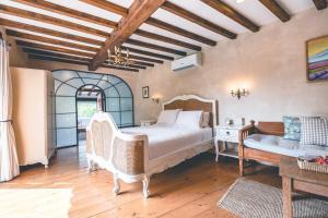 a bedroom with a bed and a couch and a table at Moon River Village in Ban Bu Khanun +170 photos