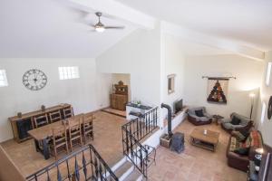 an overhead view of a living room with a table and chairs at Villa Angel by Algarve Holidays in Loulé +40 photos