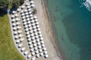 an aerial view of a beach with umbrellas at Hydra Beach Resort in Thermisía +119 photos