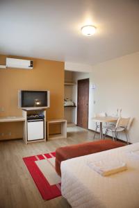 Kuchyň nebo kuchyňský kout v ubytování Hotel Palmeiras