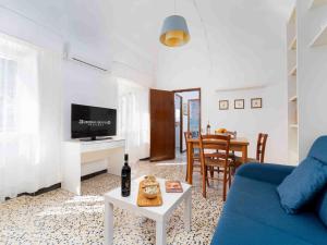 TV in/ali zabaviščno središče v nastanitvi Casa Lino