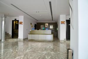 a lobby with a reception desk in a building at Alammariah Hills Resort- Riyadh in Diriyah +94 photos