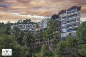 an artist rendering of an apartment building at Maverick Heights in Kasauli