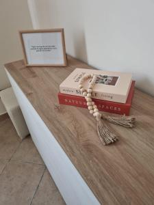 two books sitting on top of a table at Villa Sunshine in Balestrate
