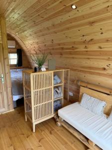 a room with a bed in a log cabin at Exotic Sea Boutique Adults Only in Protaras