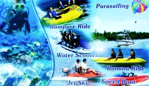 a group of people riding on boats in the water at Samant Beach Resort in Malvan