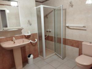 a bathroom with a shower and a toilet and a sink at Charming accommodation for 2 people in ELNE in Elne