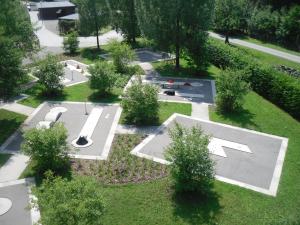 an aerial view of a park with a skate park at Pension am Park in Oschatz