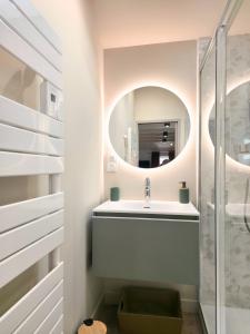 a bathroom with a sink and a mirror at cabane perche duplex st affrique in Saint-Affrique +15 photos