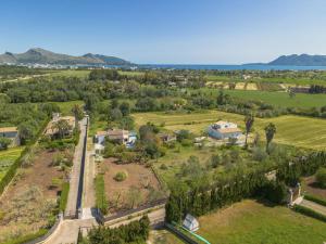 an aerial view of a village with trees and houses at Holiday Home Can Niu by Interhome in Pollença